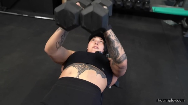Rhea_Ripley_flexes_on_Sheamus_with_her__Nightmare__Arms_workout_3771.jpg