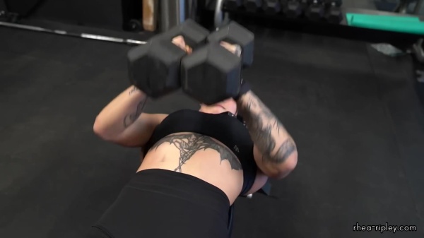 Rhea_Ripley_flexes_on_Sheamus_with_her__Nightmare__Arms_workout_3774.jpg