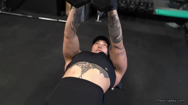 Rhea_Ripley_flexes_on_Sheamus_with_her__Nightmare__Arms_workout_3776.jpg