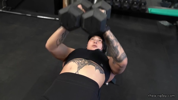 Rhea_Ripley_flexes_on_Sheamus_with_her__Nightmare__Arms_workout_3777.jpg