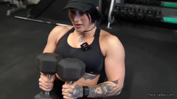 Rhea_Ripley_flexes_on_Sheamus_with_her__Nightmare__Arms_workout_3780.jpg