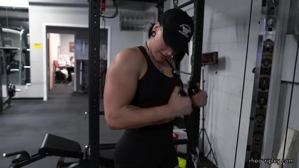 Rhea_Ripley_flexes_on_Sheamus_with_her__Nightmare__Arms_workout_3803.jpg