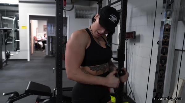 Rhea_Ripley_flexes_on_Sheamus_with_her__Nightmare__Arms_workout_3805.jpg
