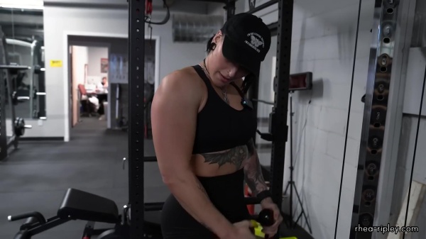 Rhea_Ripley_flexes_on_Sheamus_with_her__Nightmare__Arms_workout_3806.jpg
