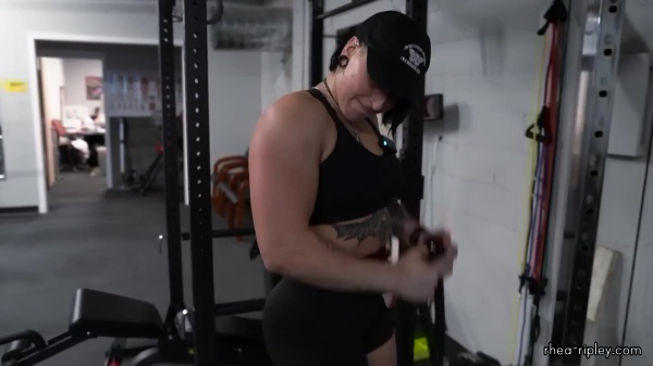 Rhea_Ripley_flexes_on_Sheamus_with_her__Nightmare__Arms_workout_3812.jpg
