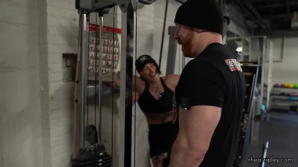 Rhea_Ripley_flexes_on_Sheamus_with_her__Nightmare__Arms_workout_3892.jpg