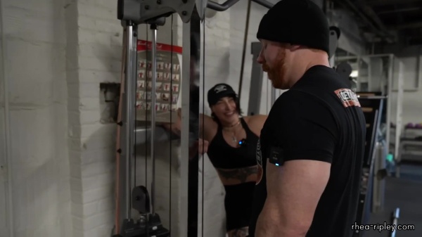 Rhea_Ripley_flexes_on_Sheamus_with_her__Nightmare__Arms_workout_3896.jpg