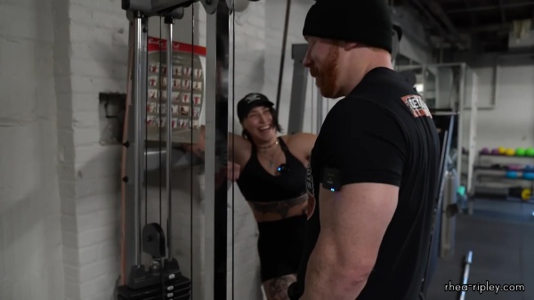 Rhea_Ripley_flexes_on_Sheamus_with_her__Nightmare__Arms_workout_3900.jpg