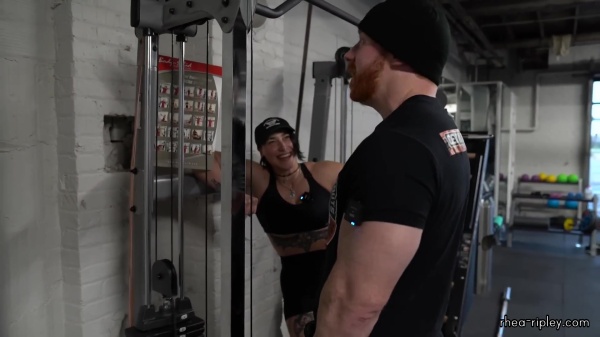 Rhea_Ripley_flexes_on_Sheamus_with_her__Nightmare__Arms_workout_3910.jpg