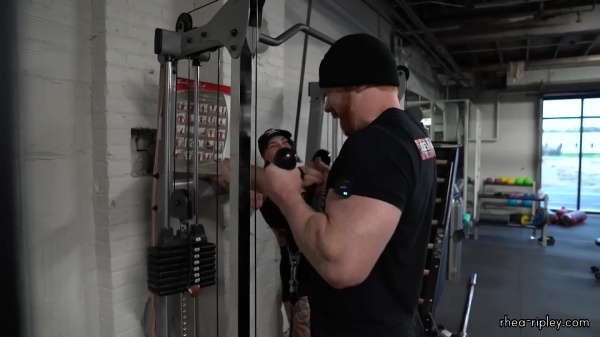 Rhea_Ripley_flexes_on_Sheamus_with_her__Nightmare__Arms_workout_3912.jpg