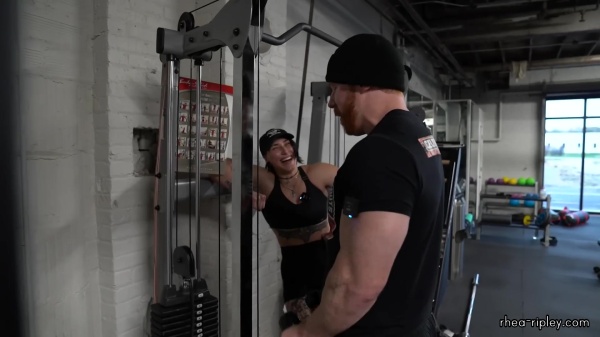 Rhea_Ripley_flexes_on_Sheamus_with_her__Nightmare__Arms_workout_3914.jpg