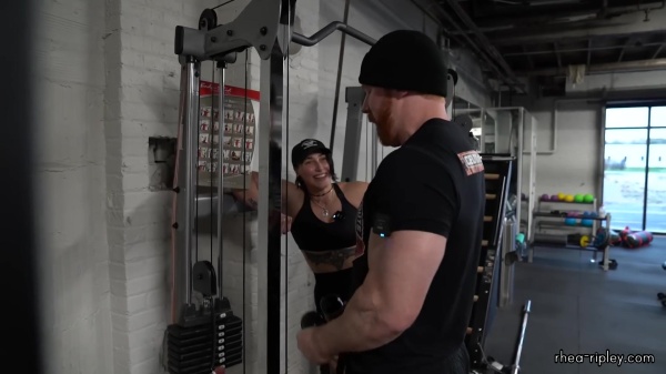 Rhea_Ripley_flexes_on_Sheamus_with_her__Nightmare__Arms_workout_3918.jpg