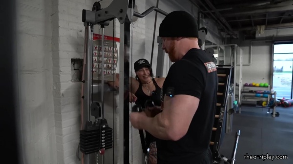 Rhea_Ripley_flexes_on_Sheamus_with_her__Nightmare__Arms_workout_3922.jpg
