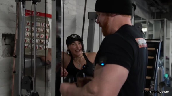 Rhea_Ripley_flexes_on_Sheamus_with_her__Nightmare__Arms_workout_3925.jpg