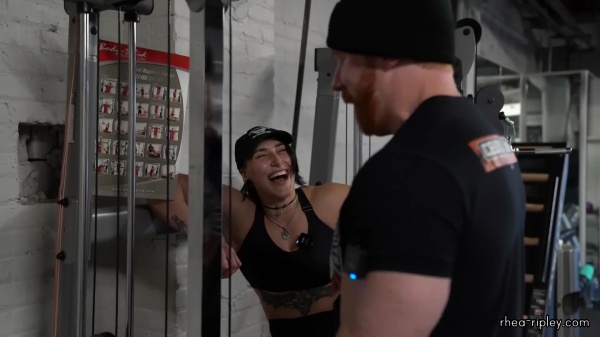 Rhea_Ripley_flexes_on_Sheamus_with_her__Nightmare__Arms_workout_3929.jpg