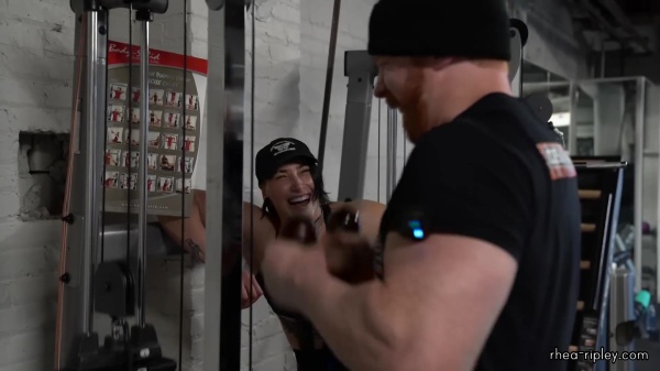 Rhea_Ripley_flexes_on_Sheamus_with_her__Nightmare__Arms_workout_3932.jpg