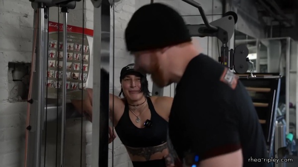 Rhea_Ripley_flexes_on_Sheamus_with_her__Nightmare__Arms_workout_3933.jpg