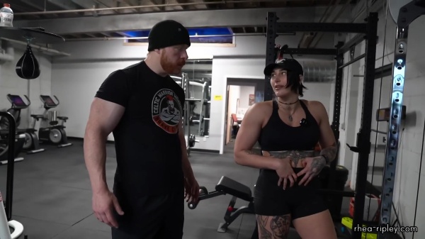Rhea_Ripley_flexes_on_Sheamus_with_her__Nightmare__Arms_workout_3987.jpg