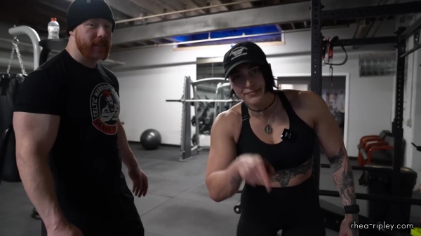Rhea_Ripley_flexes_on_Sheamus_with_her__Nightmare__Arms_workout_4021.jpg