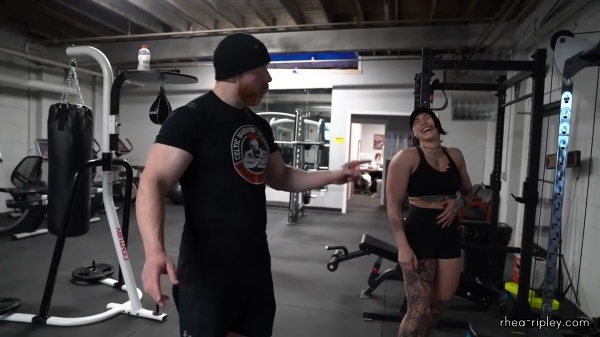 Rhea_Ripley_flexes_on_Sheamus_with_her__Nightmare__Arms_workout_4037.jpg