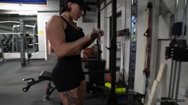 Rhea_Ripley_flexes_on_Sheamus_with_her__Nightmare__Arms_workout_4175.jpg