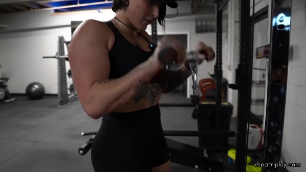 Rhea_Ripley_flexes_on_Sheamus_with_her__Nightmare__Arms_workout_4183.jpg
