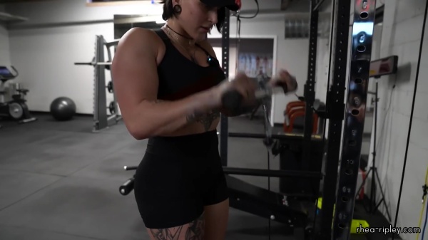 Rhea_Ripley_flexes_on_Sheamus_with_her__Nightmare__Arms_workout_4198.jpg