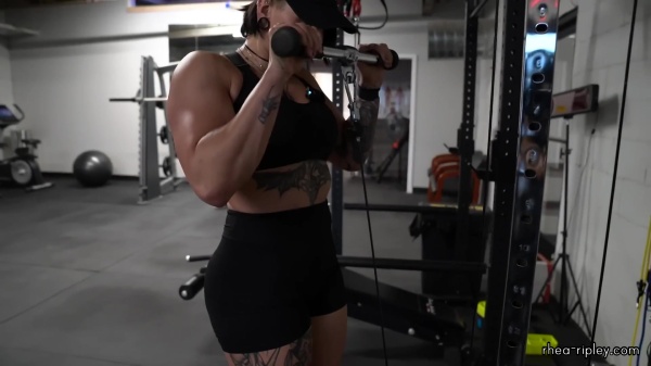 Rhea_Ripley_flexes_on_Sheamus_with_her__Nightmare__Arms_workout_4199.jpg