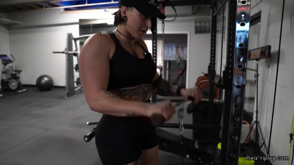 Rhea_Ripley_flexes_on_Sheamus_with_her__Nightmare__Arms_workout_4201.jpg