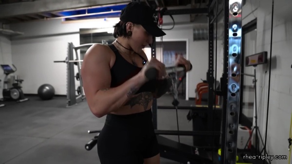 Rhea_Ripley_flexes_on_Sheamus_with_her__Nightmare__Arms_workout_4204.jpg