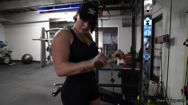Rhea_Ripley_flexes_on_Sheamus_with_her__Nightmare__Arms_workout_4206.jpg