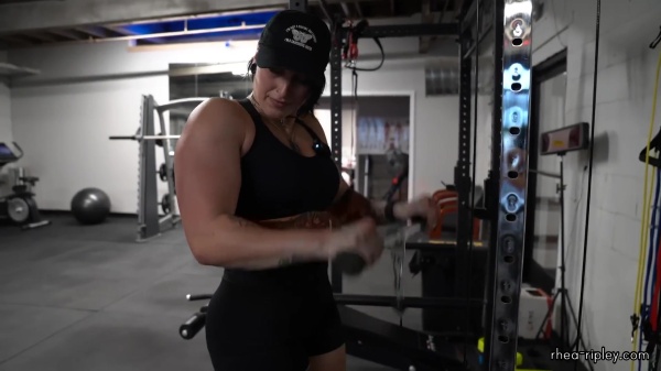 Rhea_Ripley_flexes_on_Sheamus_with_her__Nightmare__Arms_workout_4209.jpg