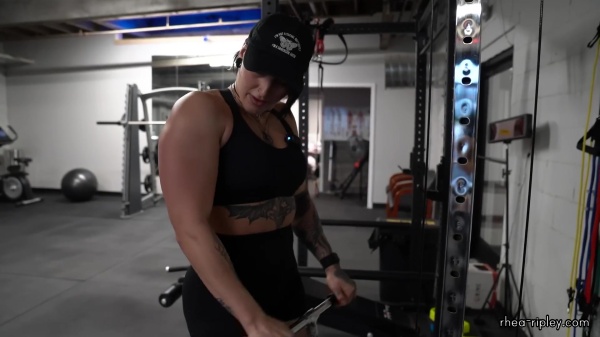 Rhea_Ripley_flexes_on_Sheamus_with_her__Nightmare__Arms_workout_4213.jpg