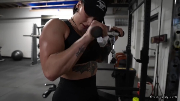 Rhea_Ripley_flexes_on_Sheamus_with_her__Nightmare__Arms_workout_4216.jpg