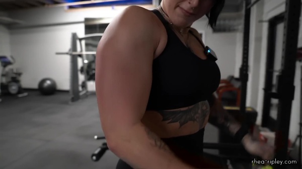 Rhea_Ripley_flexes_on_Sheamus_with_her__Nightmare__Arms_workout_4220.jpg