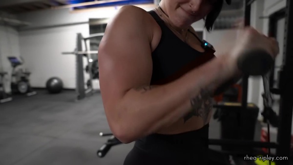 Rhea_Ripley_flexes_on_Sheamus_with_her__Nightmare__Arms_workout_4221.jpg
