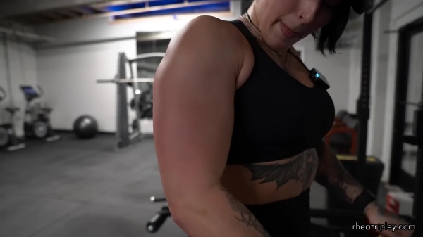 Rhea_Ripley_flexes_on_Sheamus_with_her__Nightmare__Arms_workout_4224.jpg