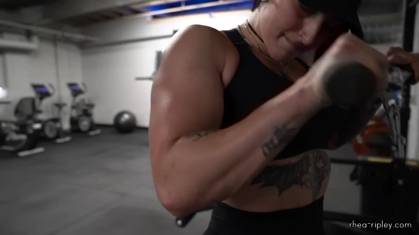 Rhea_Ripley_flexes_on_Sheamus_with_her__Nightmare__Arms_workout_4227.jpg