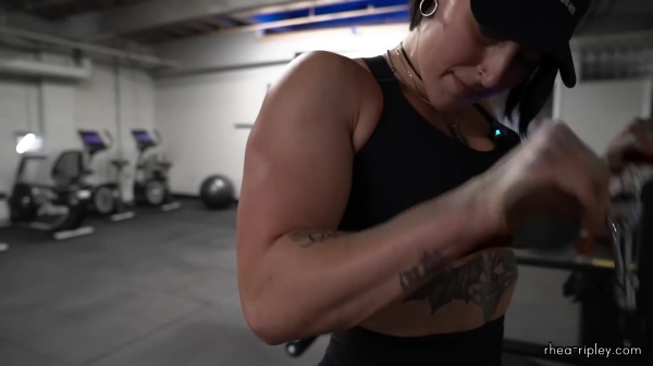 Rhea_Ripley_flexes_on_Sheamus_with_her__Nightmare__Arms_workout_4228.jpg