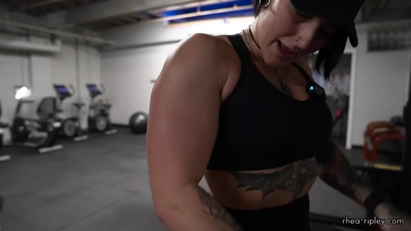 Rhea_Ripley_flexes_on_Sheamus_with_her__Nightmare__Arms_workout_4229.jpg