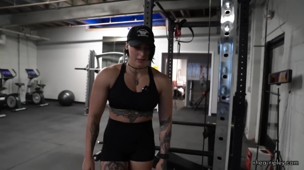 Rhea_Ripley_flexes_on_Sheamus_with_her__Nightmare__Arms_workout_4239.jpg