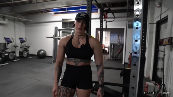 Rhea_Ripley_flexes_on_Sheamus_with_her__Nightmare__Arms_workout_4240.jpg