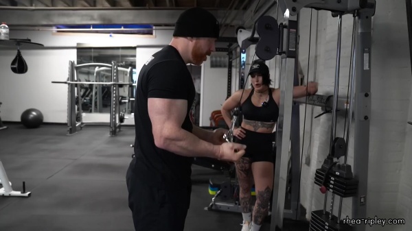 Rhea_Ripley_flexes_on_Sheamus_with_her__Nightmare__Arms_workout_4241.jpg