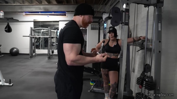 Rhea_Ripley_flexes_on_Sheamus_with_her__Nightmare__Arms_workout_4242.jpg