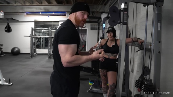 Rhea_Ripley_flexes_on_Sheamus_with_her__Nightmare__Arms_workout_4243.jpg
