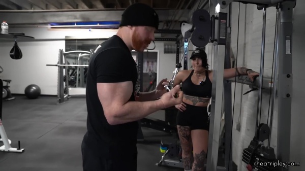 Rhea_Ripley_flexes_on_Sheamus_with_her__Nightmare__Arms_workout_4244.jpg