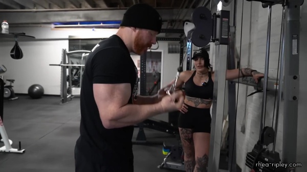 Rhea_Ripley_flexes_on_Sheamus_with_her__Nightmare__Arms_workout_4245.jpg