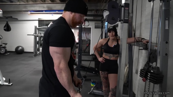 Rhea_Ripley_flexes_on_Sheamus_with_her__Nightmare__Arms_workout_4247.jpg