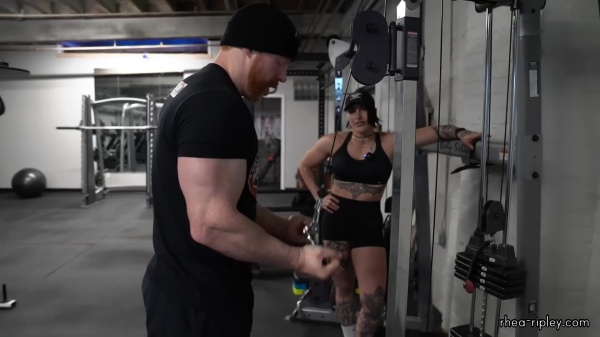 Rhea_Ripley_flexes_on_Sheamus_with_her__Nightmare__Arms_workout_4249.jpg