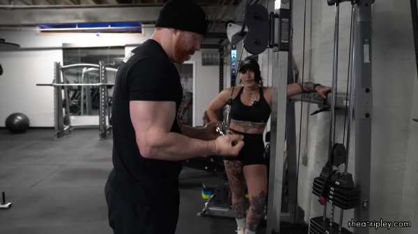 Rhea_Ripley_flexes_on_Sheamus_with_her__Nightmare__Arms_workout_4250.jpg